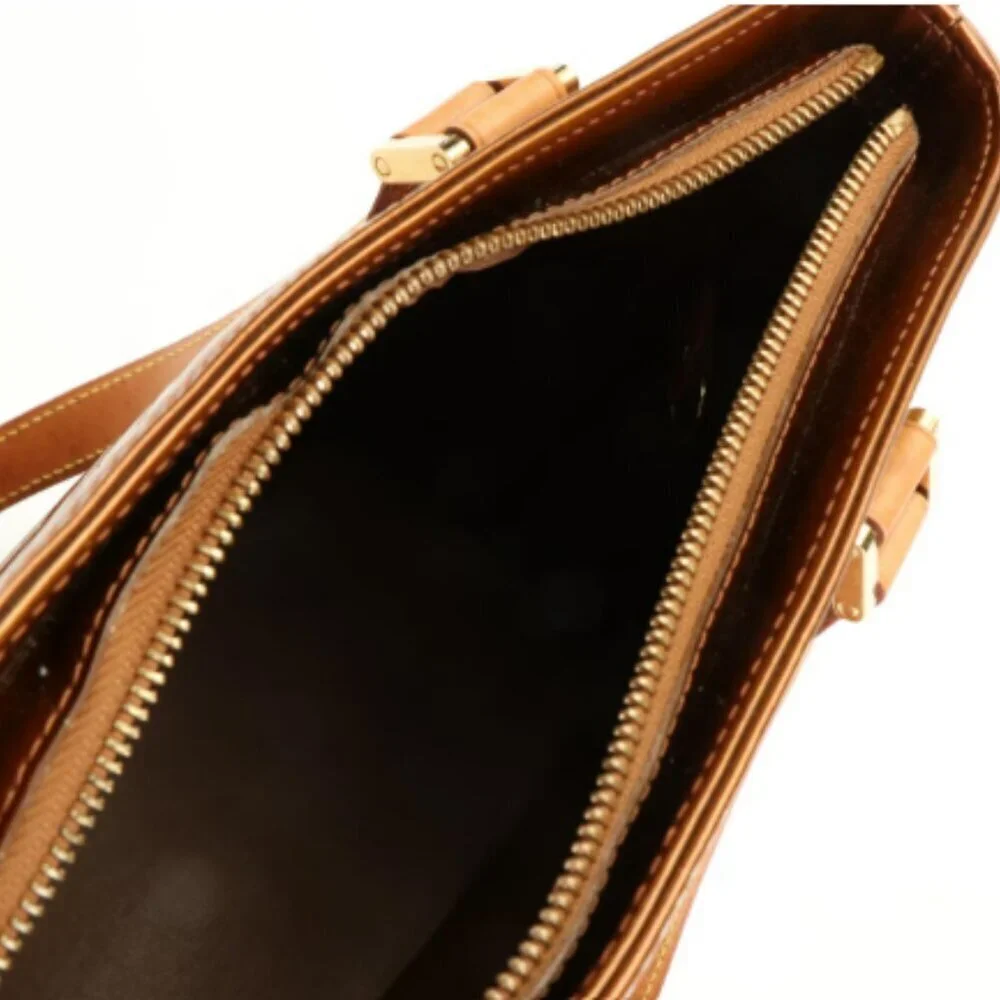 Louis Vuitton Monogram Vernis Houston tote bag in the color Bronze.